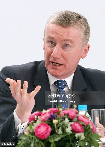 Fred Goodwin, chief executive officer of the Royal Bank of Scotland Group, speaks during a joint news conference with Li Lihui, vice chairman and...