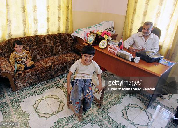 Hussein Matrud , the head of the Iraqi handicapped organization, is pictured at his office on November 12, 2009 in the city of Falluja west of...