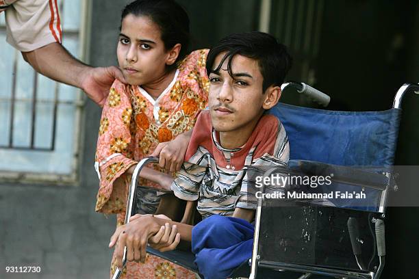 Anas Hamed , and his sister Inas who suffer from birth defects are pictured on November 12, 2009 in the city of Falluja west of Baghdad, Iraq. Birth...
