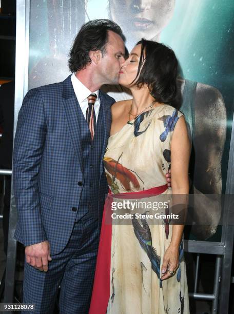 Walton Goggins and Nadia Conners attend the premiere of Warner Bros. Pictures' "Tomb Raider" at TCL Chinese Theatre on March 12, 2018 in Hollywood,...