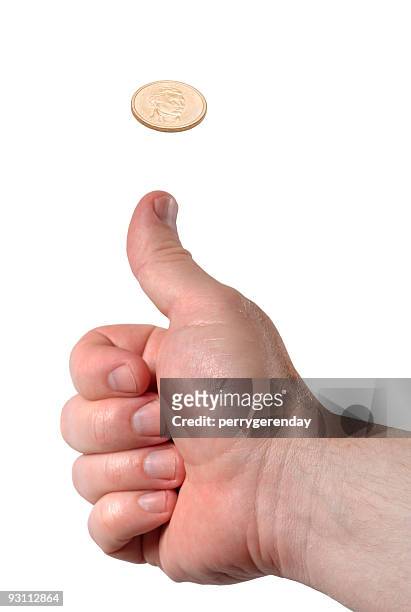 thumb up, coin flip - flipping a coin stock pictures, royalty-free photos & images