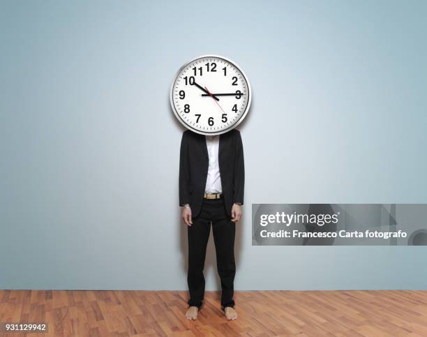 time is money - standing barefoot stock pictures, royalty-free photos & images
