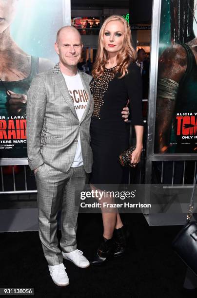 Tom Holkenborg aka Junkie XL and guest attend the premiere of Warner Bros. Pictures' "Tomb Raider" at TCL Chinese Theatre on March 12, 2018 in...