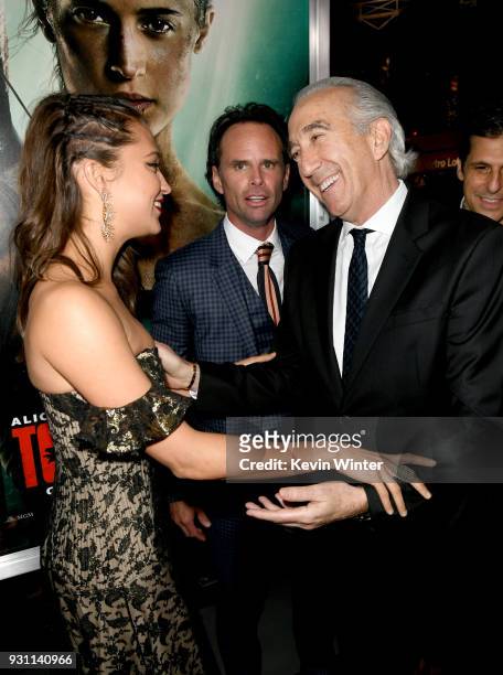Alicia Vikander, Walton Goggins, and Gary Barber attend the premiere of Warner Bros. Pictures' "Tomb Raider" at TCL Chinese Theatre on March 12, 2018...