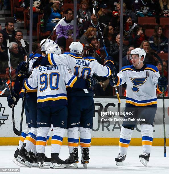 Vladimir Tarasenko of the St. Louis Blues celebrates a first period goal with Nikita Soshnikov and Brayden Schenn during the game against the Anaheim...