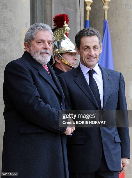 French President Nicolas Sarkozy welcomes his Brazilian counterpart Luiz Inacio Lula da Silva prior to a meeting on November 14, 2009 at the Elysee...