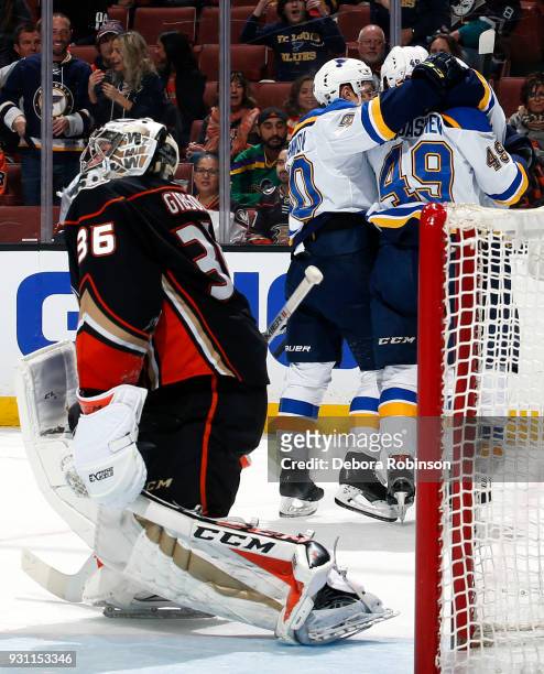 Nikita Soshnikov and Ivan Barbashev of the St. Louis Blues celebrate a second period goal against John Gibson of the Anaheim Ducks during the game on...