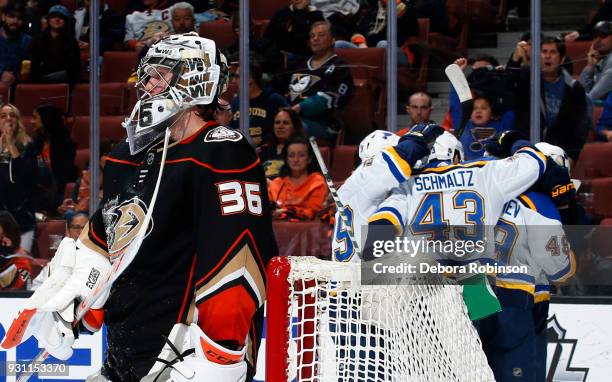 Vince Dunn, Jordan Schmaltz, and Ivan Barbashev of the St. Louis Blues celebrate a second period goal against John Gibson of the Anaheim Ducks during...