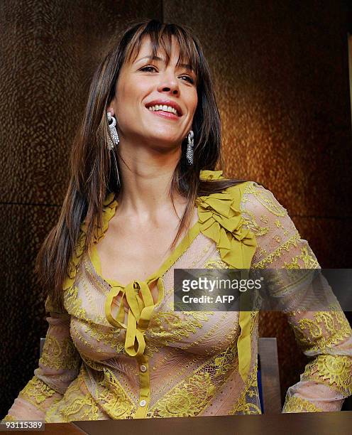 Top French actress Sophie Marceau who starred as the femme fatal in a James Bond movie, addresses media during the opening ceremony of the new...
