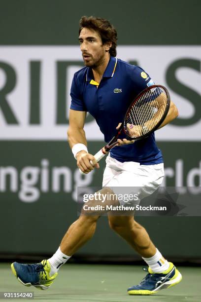 Pablo Cuevas of Uraguay plays Dominic Thiem of Austria during the BNP Paribas Open at the Indian Wells Tennis Garden on March 12, 2018 in Indian...