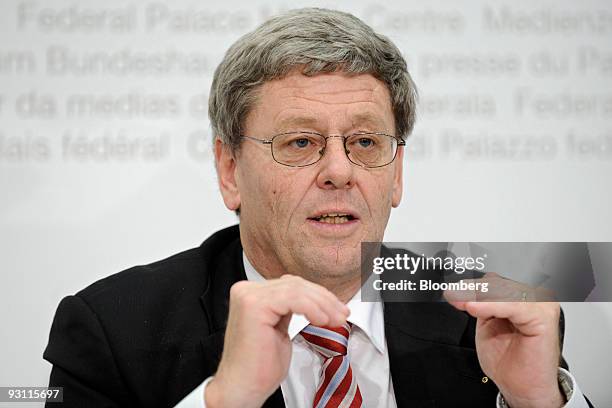 Urs Ursprung, director of the Swiss Federal Tax Department, gestures while speaking at a news conference in Bern, Switzerland, on Tuesday, Nov. 17,...