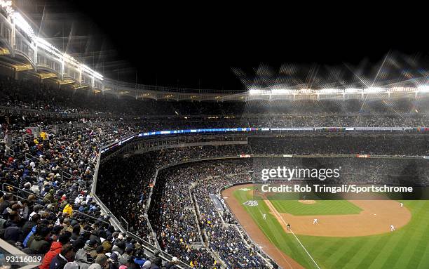 General view of Yankee Stadium shot with a wide angle lens from the upper deck at night during a game between the New York Yankees and the...