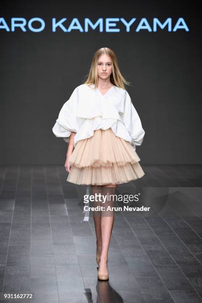 Model walks the runway wearing Kentaro Kameyama at Los Angeles Fashion Week Powered by Art Hearts Fashion LAFW FW/18 10th Season Anniversary at The...