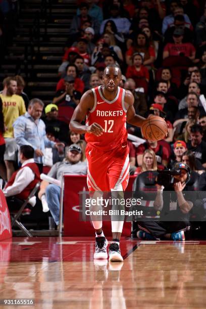 Luc Mbah a Moute of the Houston Rockets handles the ball against the San Antonio Spurs on March 12, 2018 at the Toyota Center in Houston, Texas. NOTE...