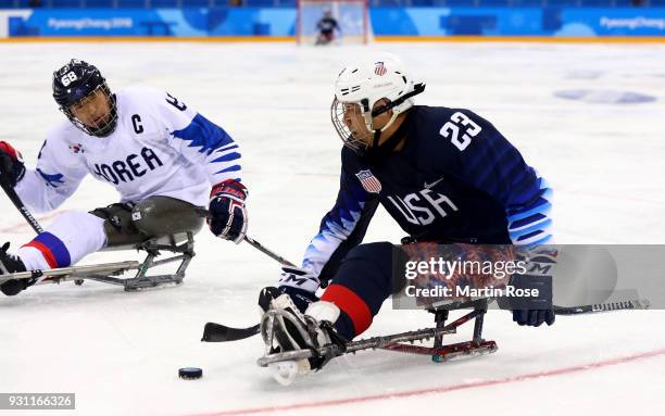 Rico Roman of United States in action against Korea in the Ice Hockey Preliminary Round - Group B game between United States and Korea during day...