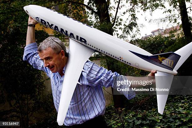 Ryanair CEO Michael O'Leary poses with a model airplane ahead of a press conference on November 17, 2009 in Milan, Italy. O'Leary presented the...