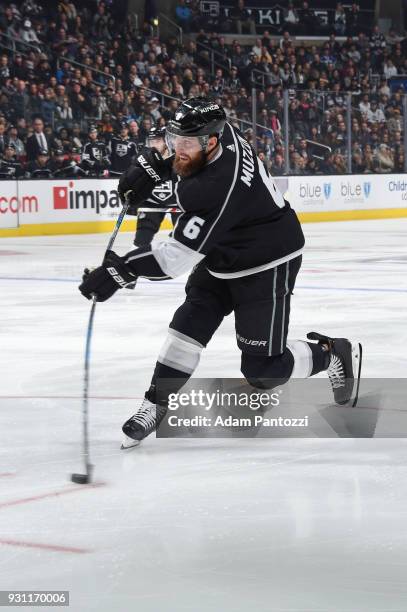 Jake Muzzin of the Los Angeles Kings shoots the puck during a game against the Vancouver Canucks at STAPLES Center on March 12, 2018 in Los Angeles,...