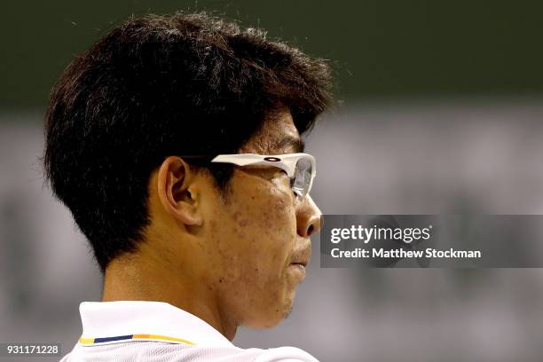 Hyeon Chung of Korea cools down between games while playing Tomas Berdych of Czech Republic during the BNP Paribas Open at the Indian Wells Tennis...