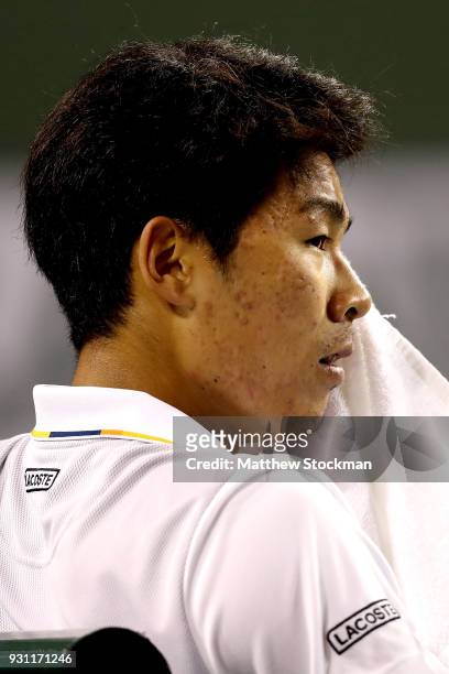 Hyeon Chung of Korea cools down between games while playing Tomas Berdych of Czech Republic during the BNP Paribas Open at the Indian Wells Tennis...