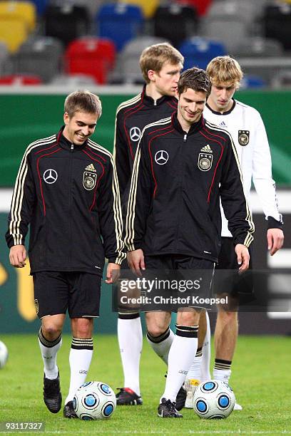 Philipp Lahm, Per Mertesacker, Arne Friedrich and Stefan Kiessling are seen during a German National team training session at the Esprit Arena on...