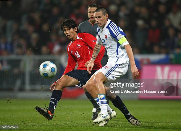 Matias Fernandez Chile battles for the ball with Marek Hamsik of Slovakia during the international friendly match between Slovakia and Chile at the...