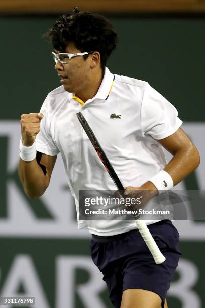 Hyeon Chung of Korea celebrates a point against Tomas Berdych of Czech Republic during the BNP Paribas Open at the Indian Wells Tennis Garden on...