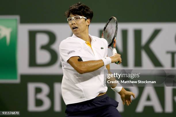 Hyeon Chung of Korea returns a shot to Tomas Berdych of Czech Republic during the BNP Paribas Open at the Indian Wells Tennis Garden on March 12,...