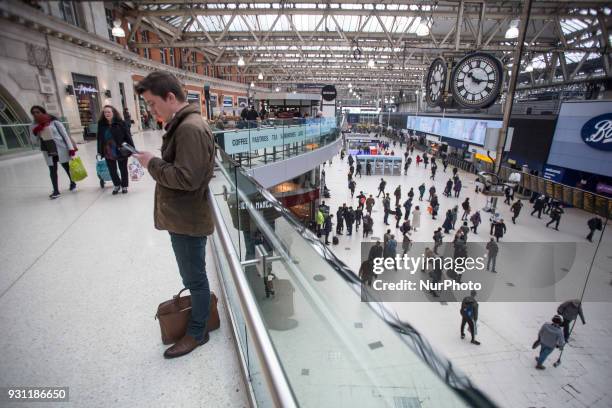 Visitors at the Waterloo station in London on 21 Febrauray 2018. London Waterloo station is one of the central station in the National Rail network...