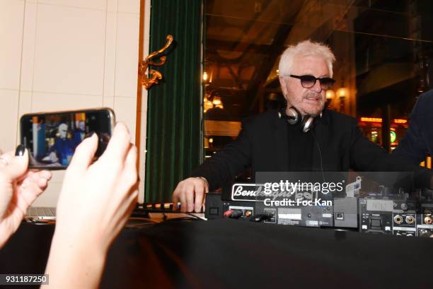 Marc Cerrone performs as DJ during Marc Cerrone Exhibition Preview at Deux Magots on March 12, 2018 in Paris, France.