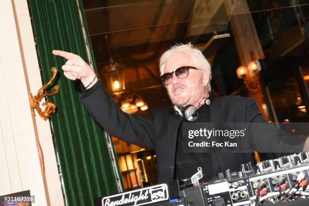 Marc Cerrone performs as DJ during Marc Cerrone Exhibition Preview at Deux Magots on March 12, 2018 in Paris, France.