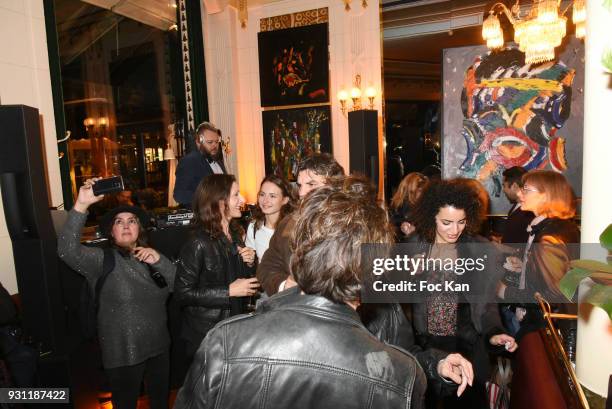 General view of atmosphere with Marc Cerrone paintings exhibited during Marc Cerrone Exhibition Preview at Deux Magots on March 12, 2018 in Paris,...