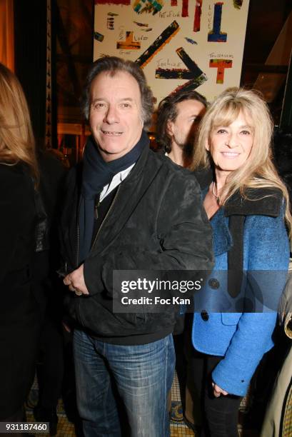 Actor Daniel Russo and his wife Lucie Russoe attend Marc Cerrone Exhibition Preview at Deux Magots on March 12, 2018 in Paris, France.