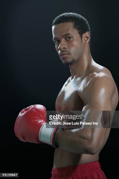 serious mixed race boxer - mixed boxing bildbanksfoton och bilder