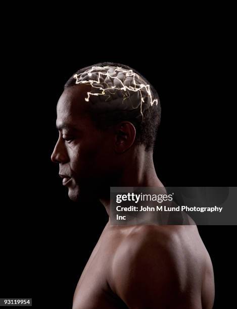brain activity of mixed race man - neurotransmissor imagens e fotografias de stock