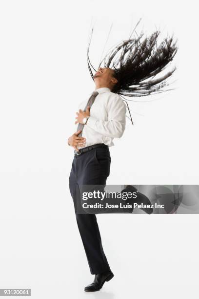 mixed race businessman with long braids - mixed race man standing studio stockfoto's en -beelden