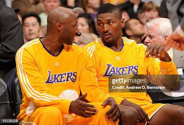 Lamar Odom and Ron Artest of the Los Angeles Lakers talk on the bench during the game against the Memphis Grizzlies on November 6, 2009 at Staples...