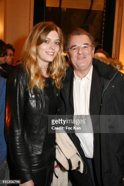 Lea Rostain and her father photographer Pascal Rostain attend Marc Cerrone Exhibition Preview at Deux Magots a on March 12, 2018 in Paris, France.