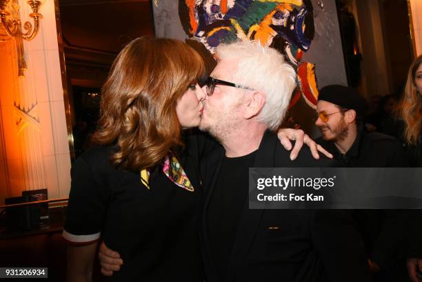 Jill Cerrone and her husband Marc Cerrone attend Marc Cerrone Exhibition Preview at Deux Magots a on March 12, 2018 in Paris, France.