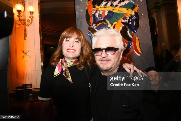 Jill Cerrone and her husband Marc Cerrone attend Marc Cerrone Exhibition Preview at Deux Magots a on March 12, 2018 in Paris, France.
