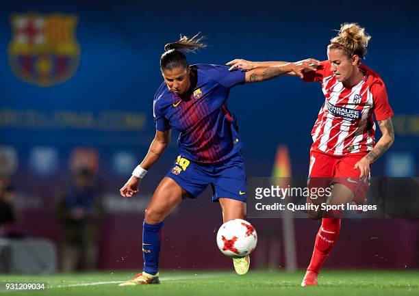 Fabiana Baiana of Barcelona competes for the ball with Angela Sosa of Atletico de Madrid during the Liga Femenina match between FC Barcelona Women...