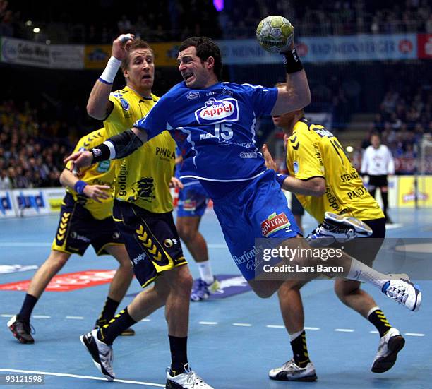 Oliver Roggisch of Rhein Neckar challenges Florian Kehrmann of Lemgo during the Handball Bundesliga match between TBV Lemgo and Rhein Neckar Loewen...