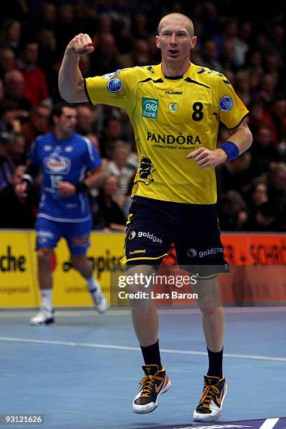 Karol Bielecki of Rhein Neckar celebrates during the Handball Bundesliga match between TBV Lemgo and Rhein Neckar Loewen at the Lipperlandhalle on...