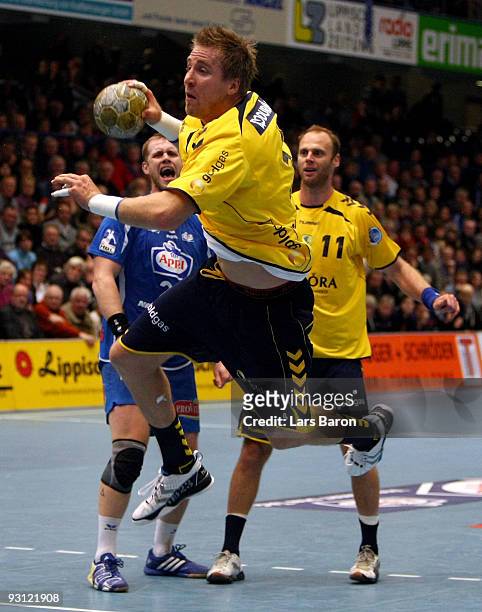 Oliver Roggisch of Rhein Neckar throws on goal during the Handball Bundesliga match between TBV Lemgo and Rhein Neckar Loewen at the Lipperlandhalle...