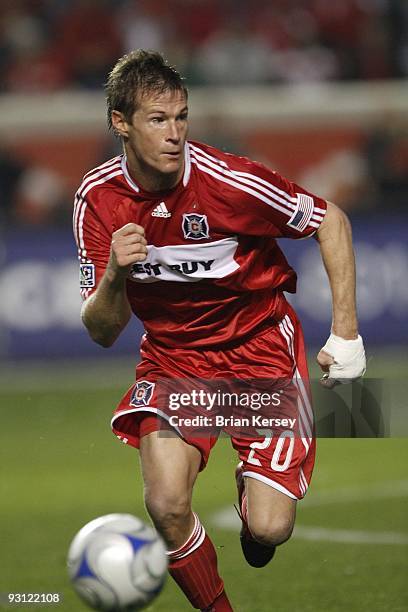 Brian McBride of the Chicago Fire chases after the ball against Real Salt Lake during the second half of the MLS Eastern Conference Championship at...