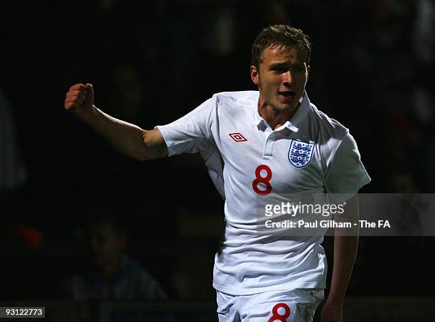 Dean Parrett of England celebrates scoring the first goal for England during the international match between England U19 and Turkey U19 at Glanford...