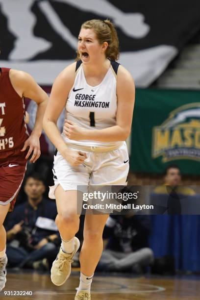 Kelsi Mahoney of the George Washington Colonials celebrates a shot during the Championship game of the Atlantic-10 Women's Basketball Tournament...