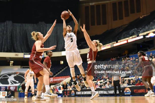 Brianna Cummings of the George Washington Colonials takes a jump shot during the Championship game of the Atlantic-10 Women's Basketball Tournament...