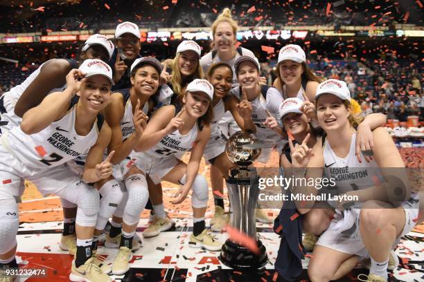 The George Washington Colonials celebrate winning the Championship game of the Atlantic-10 Women's Basketball Tournament against the George...