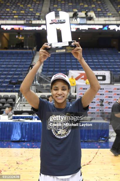 Brianna Cummings of the George Washington Colonials celebrates winning the MVP after the Championship game of the Atlantic-10 Women's Basketball...