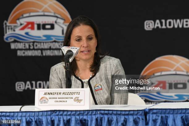 Head coach Jennifer Rizzotti of the George Washington Colonials addresses the media after the Championship game of the Atlantic-10 Women's Basketball...